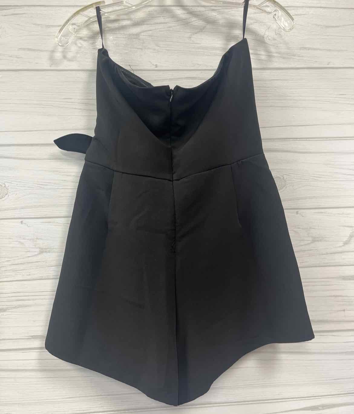 Size M she + sky Romper
